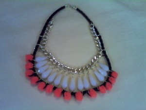 Choker with black thick leather cord, chain, tears and pom pom